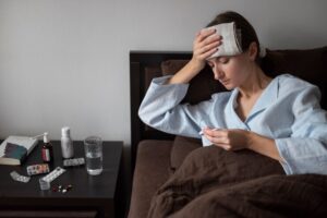 Managing migraines and fever-like symptoms